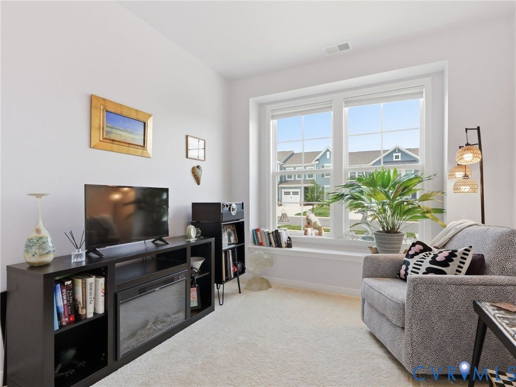9237 Cerulean Place, Richmond, VA 23238 Bedroom # 2 - A peaceful retreat w/lots of natural light. Can be used as an office, sep living space, bedroom, library/reading room, craft room or whatever your imagination can envision. Bright and airy. Plush carpeting. 1st Floor.