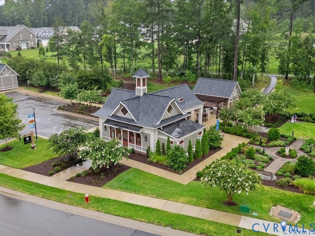 9237 Cerulean Place, Richmond, VA 23238 Area view of the Conservatory. Look at that landscaping calling to you to come take a stroll and take it all in.