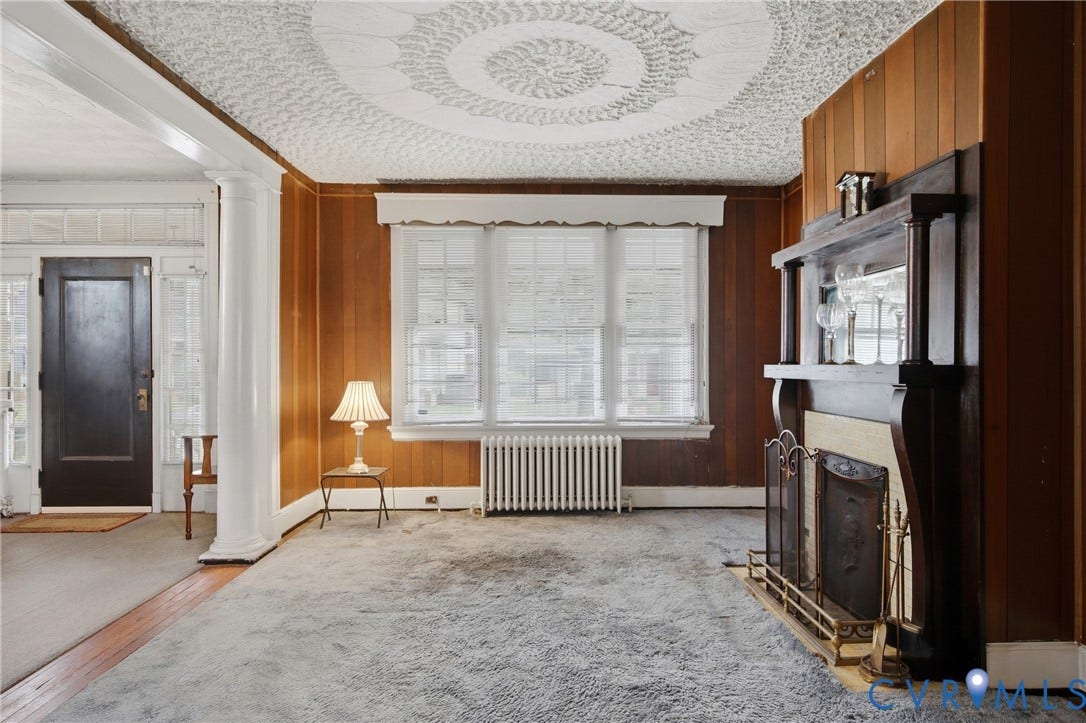 3110 North Avenue, Brookland Park, Richmond, VA 23222 Wood-paneled walls with a decorative ceiling medallion