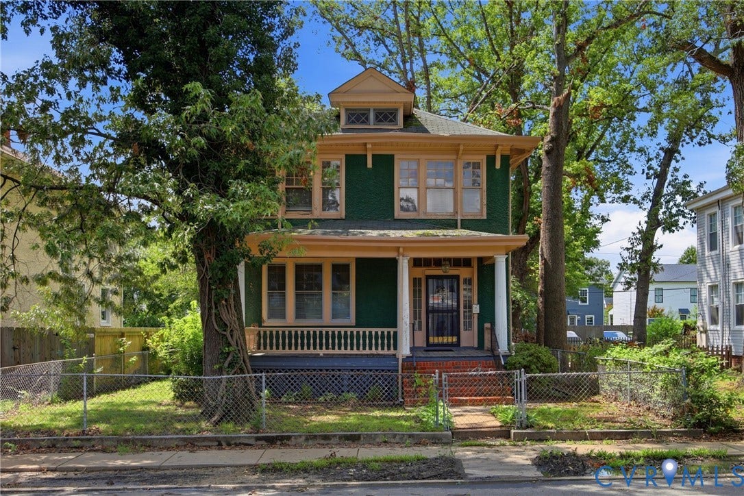 3110 North Avenue, Brookland Park, Richmond, VA 23222 Two-story exterior with a covered porch, multiple windows, and a fenced front yard