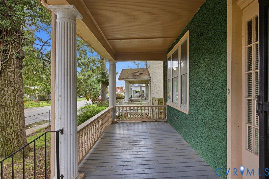 3110 North Avenue, Brookland Park, Richmond, VA 23222 Charming wraparound porch featuring tapered columns, wood-finish flooring, and decorative balustrade railings
