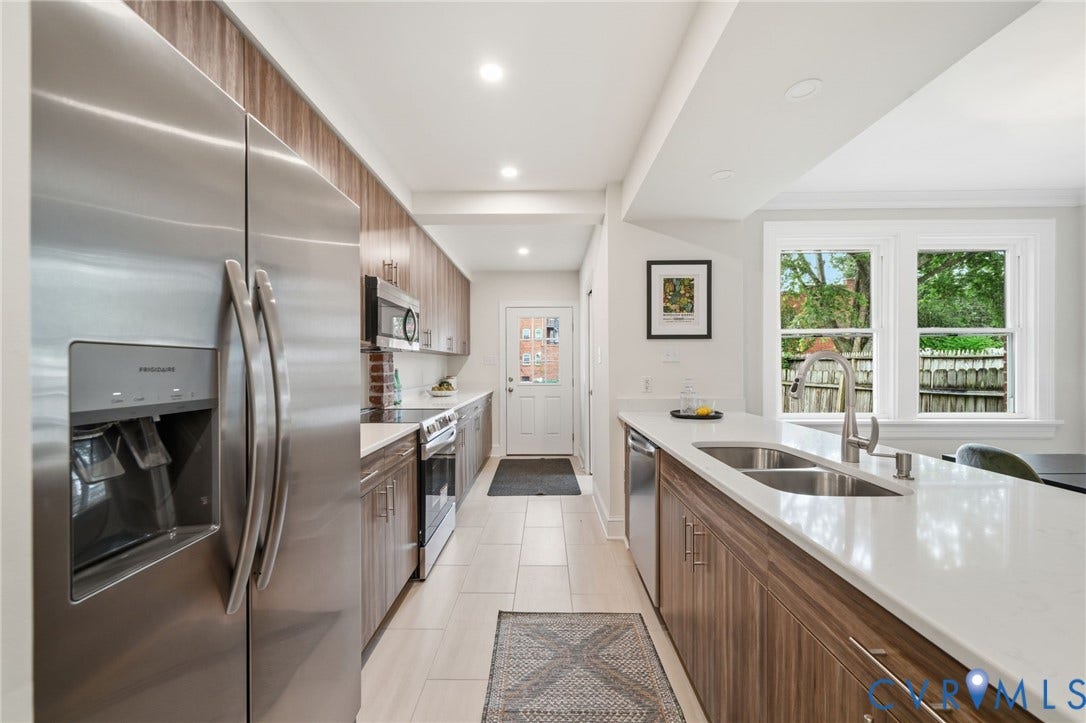 2919 Grayland Avenue, Byrd Park/ Carytown, Richmond, VA 23221 Contemporary kitchen featuring stainless steel appliances, wood-finish cabinetry, recessed lighting, and a dual-basin undermount sink with a pull-down faucet