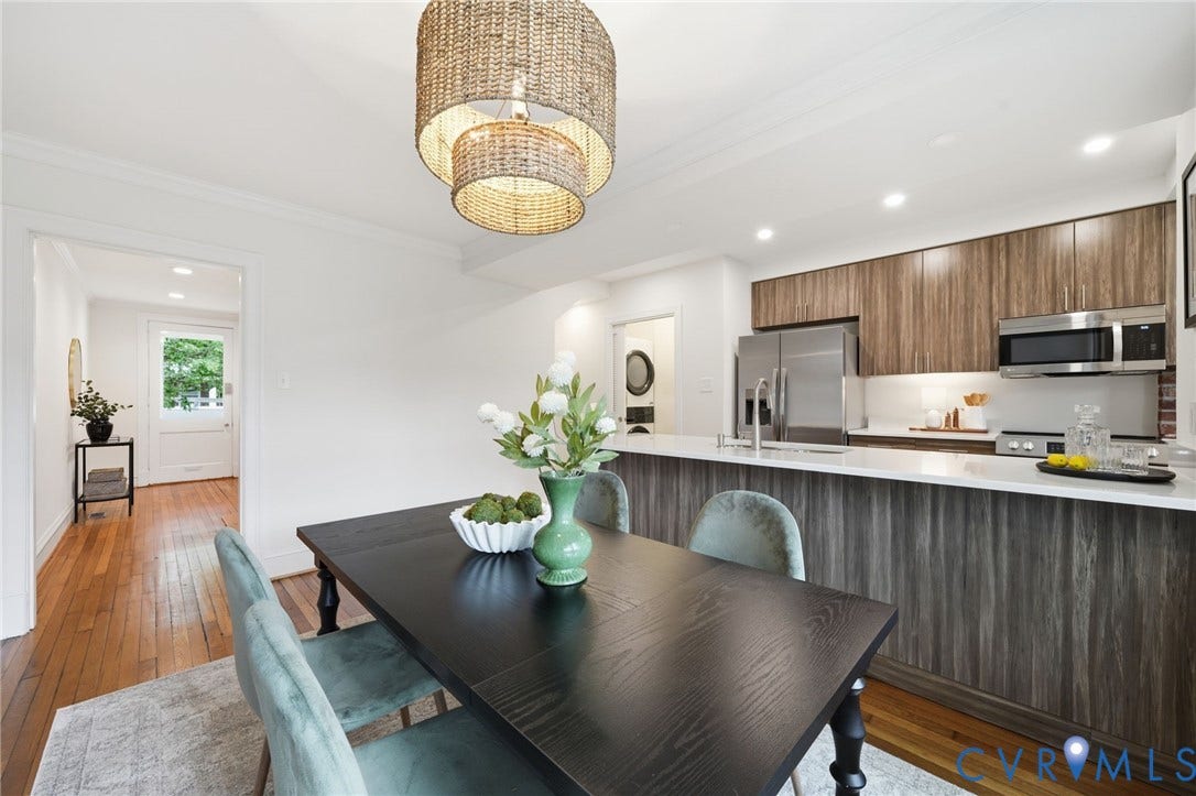 2919 Grayland Avenue, Byrd Park/ Carytown, Richmond, VA 23221 Open-concept kitchen and dining area featuring a woven pendant light fixture, wood-finish flooring, white countertops, and stainless steel appliances