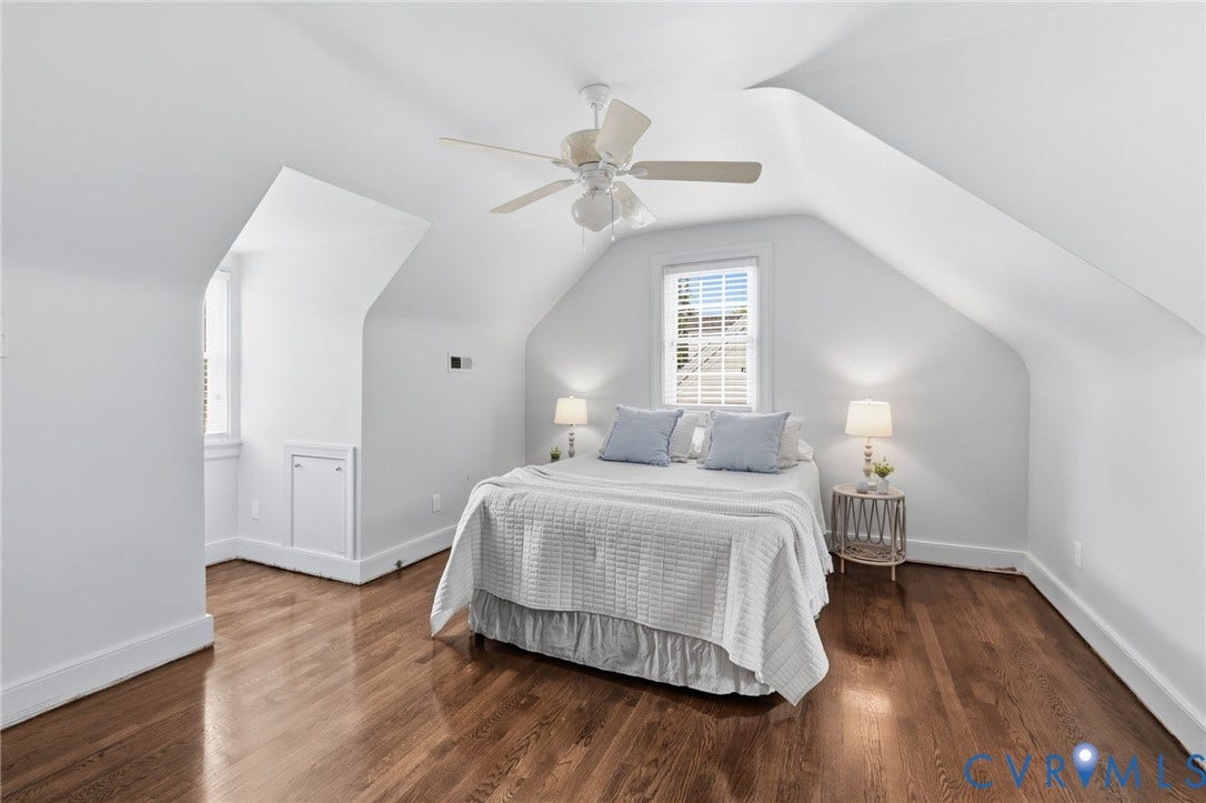 1002 Normandy Drive, Henrico, VA 23229 Hardwood flooring, sloped ceilings, a window with plantation shutters, ceiling fan, and built-in storage access