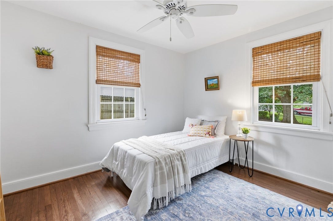 1002 Normandy Drive, Henrico, VA 23229 Hardwood-finish flooring, white walls, and a ceiling fan with light fixture