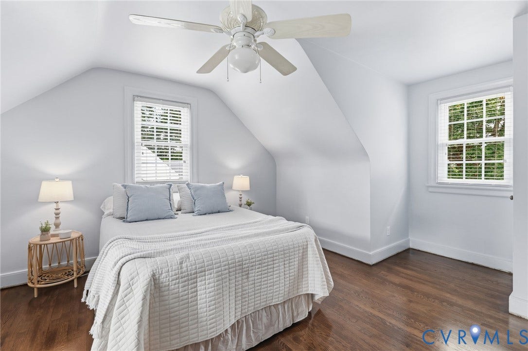 1002 Normandy Drive, Henrico, VA 23229 Hardwood flooring, painted white walls, white trim, recessed windows, and an overhead ceiling fan