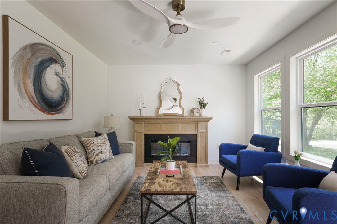 3056 Davis Mill Road, Goochland, VA 23063 Living area featuring light wood-finish flooring and multiple windows