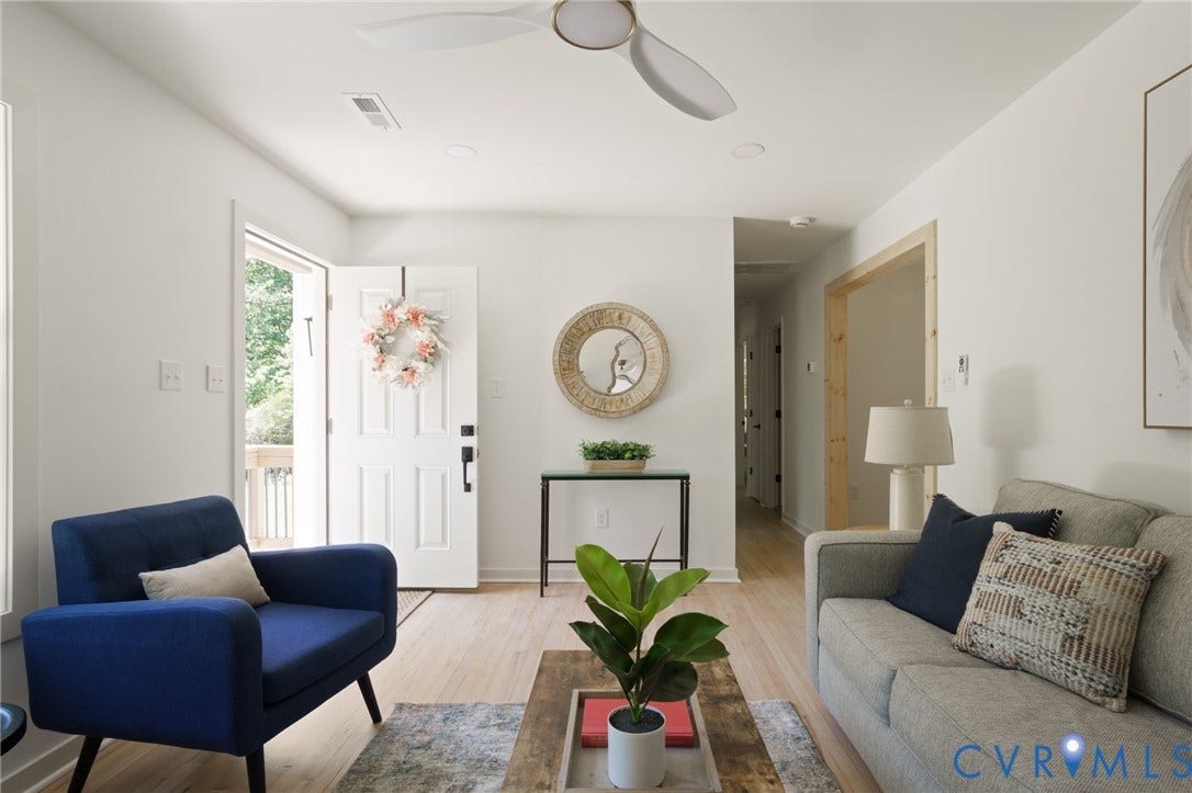 3056 Davis Mill Road, Goochland, VA 23063 Bright living space featuring light wood-finish flooring, recessed lighting, and a contemporary ceiling fan