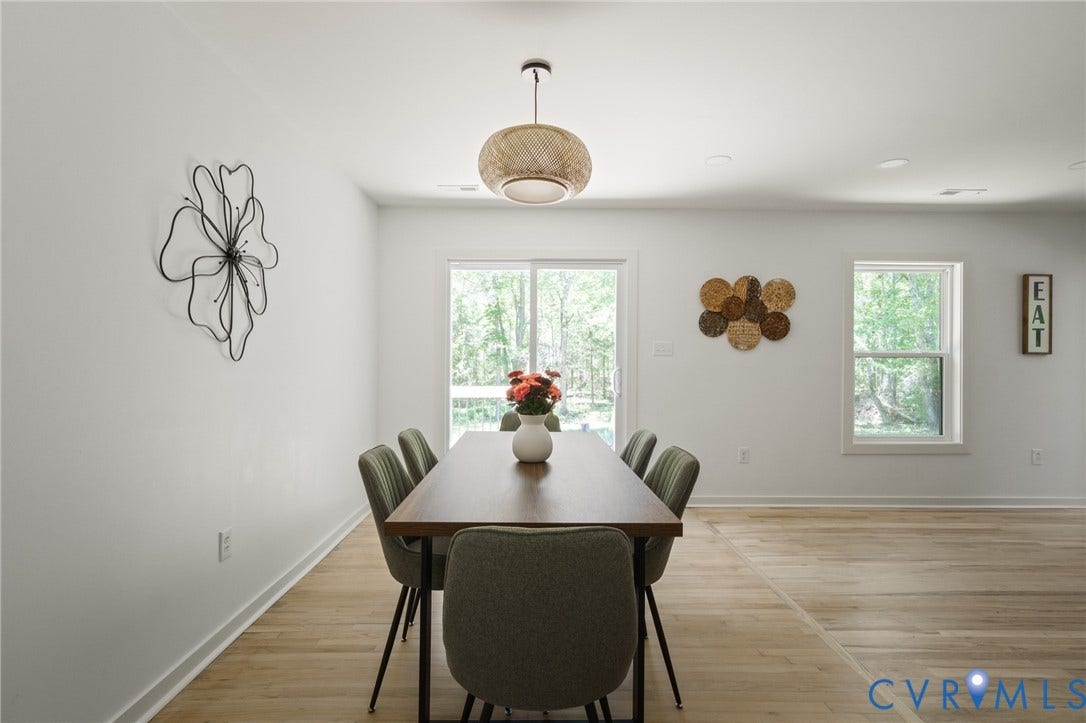 3056 Davis Mill Road, Goochland, VA 23063 Open-concept interior featuring light wood-finish flooring, recessed lighting, and a sliding glass door