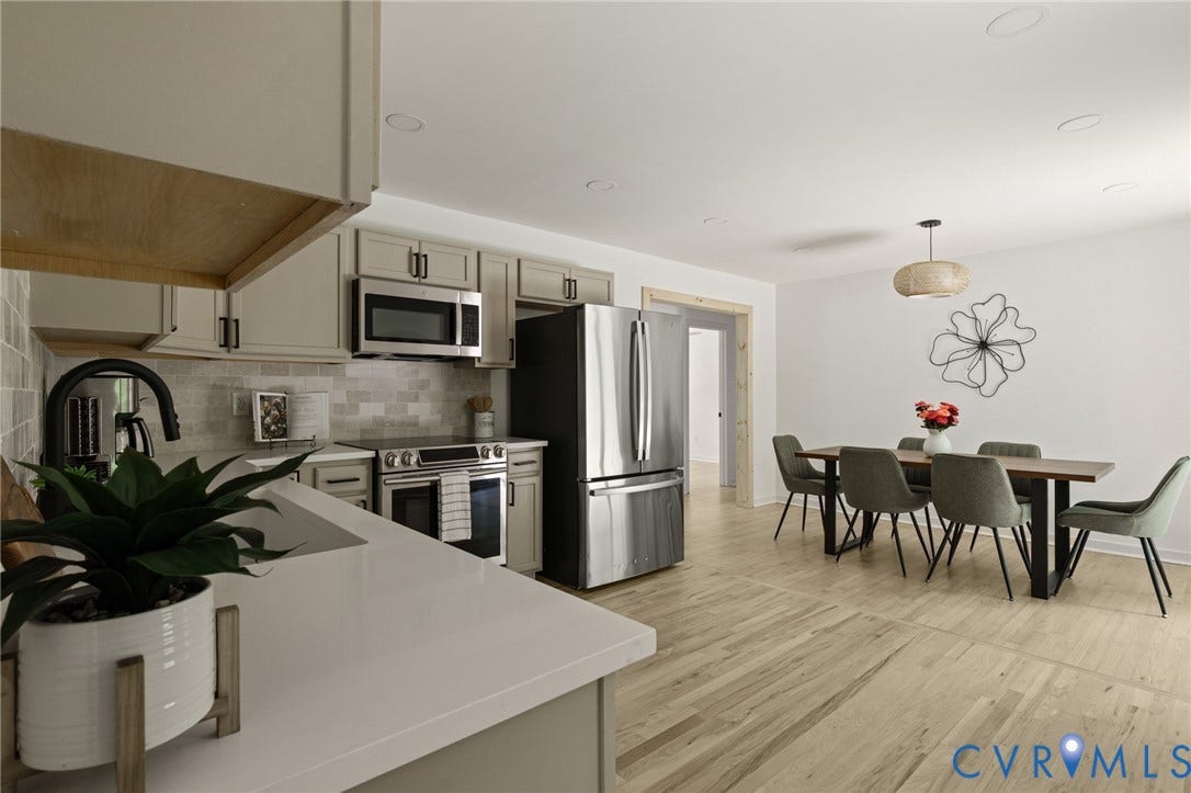 3056 Davis Mill Road, Goochland, VA 23063 Open-concept kitchen and dining area featuring light wood-finish flooring