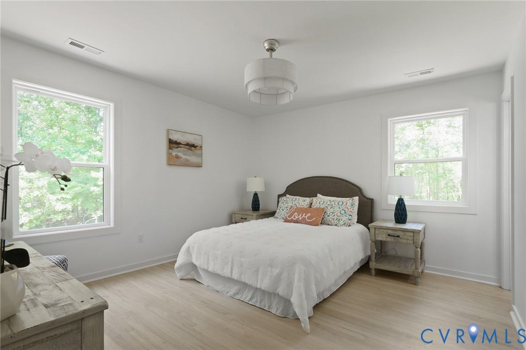 3056 Davis Mill Road, Goochland, VA 23063 Bright bedroom featuring light wood-finish flooring and white walls