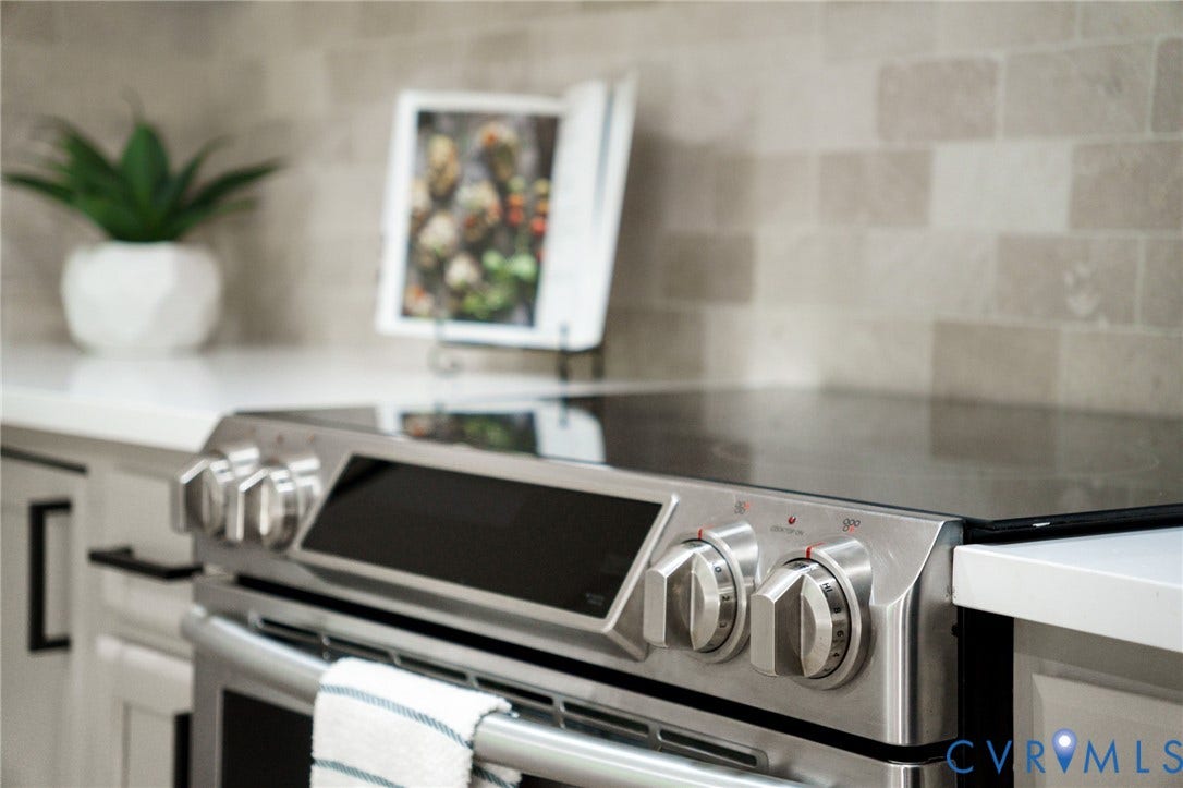 3056 Davis Mill Road, Goochland, VA 23063 Stainless steel range with a smooth black cooktop