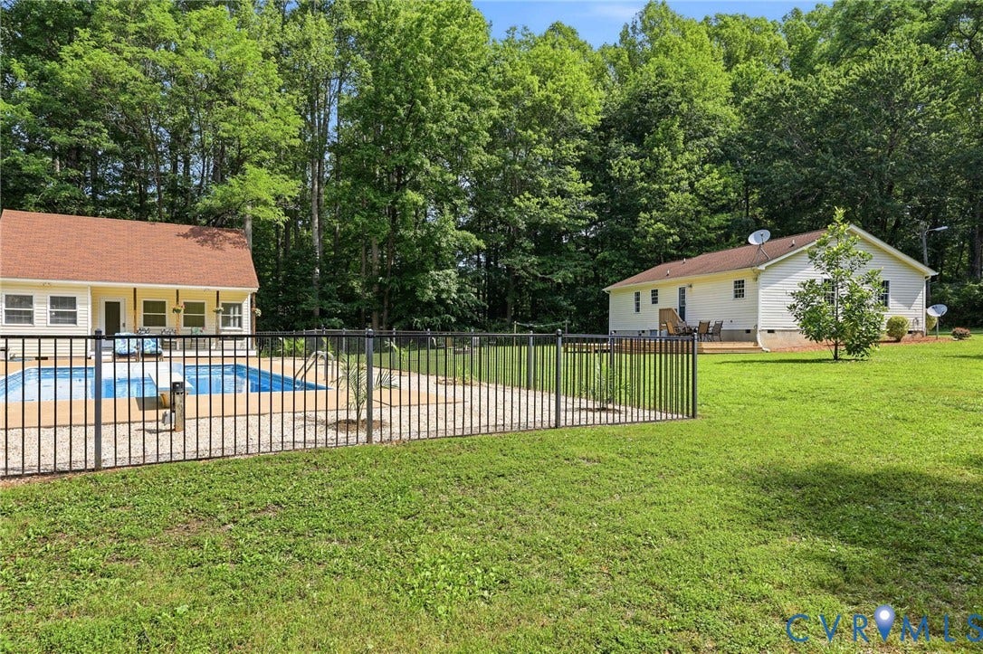 1375 Gills Road, Powhatan, VA 23139 Fenced in-ground pool with screened porch, outdoor shower, poolhouse with covered porch, full bath, space for an office or any number of uses!