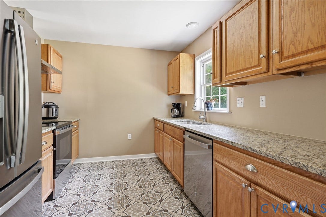 1375 Gills Road, Powhatan, VA 23139 Everything is new in this kitchen: Granite counters, cabinets, ceramic tile flooring appliances!