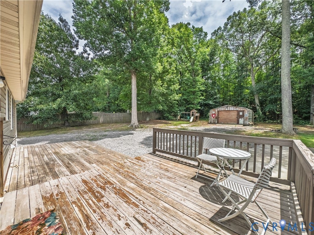 Deck overlooking large back yard