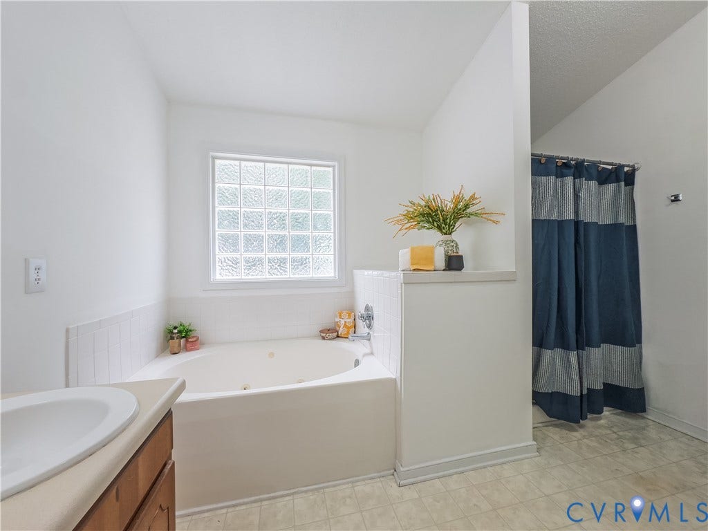 Primary Bathroom, large garden tub, separate shower