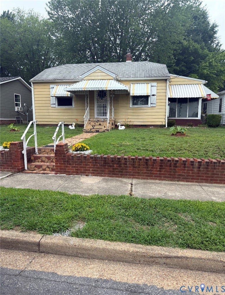 1608 N 25th Street, Churchill, Richmond, VA 23223 Single-story residence featuring light yellow siding and a gray shingle roof