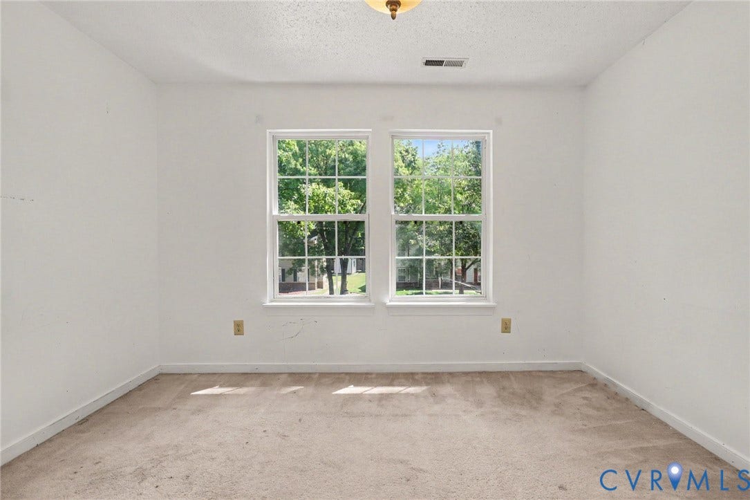931 Hunters Run Drive, Henrico, VA 23223 Bright and spacious bedroom flooded with natural light through dual double-hung windows