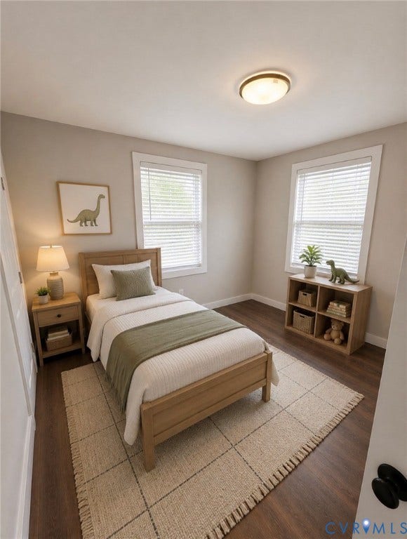 3909 Corbin Street, Wahington Park, Richmond, VA 23222 Bedroom with two windows featuring white blinds, wood-finish flooring, and a flush-mount ceiling light fixture