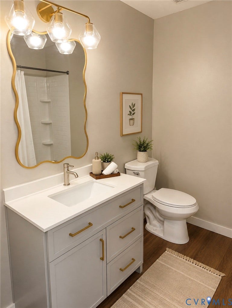 3909 Corbin Street, Wahington Park, Richmond, VA 23222 Light gray vanity with a white countertop and integrated sink