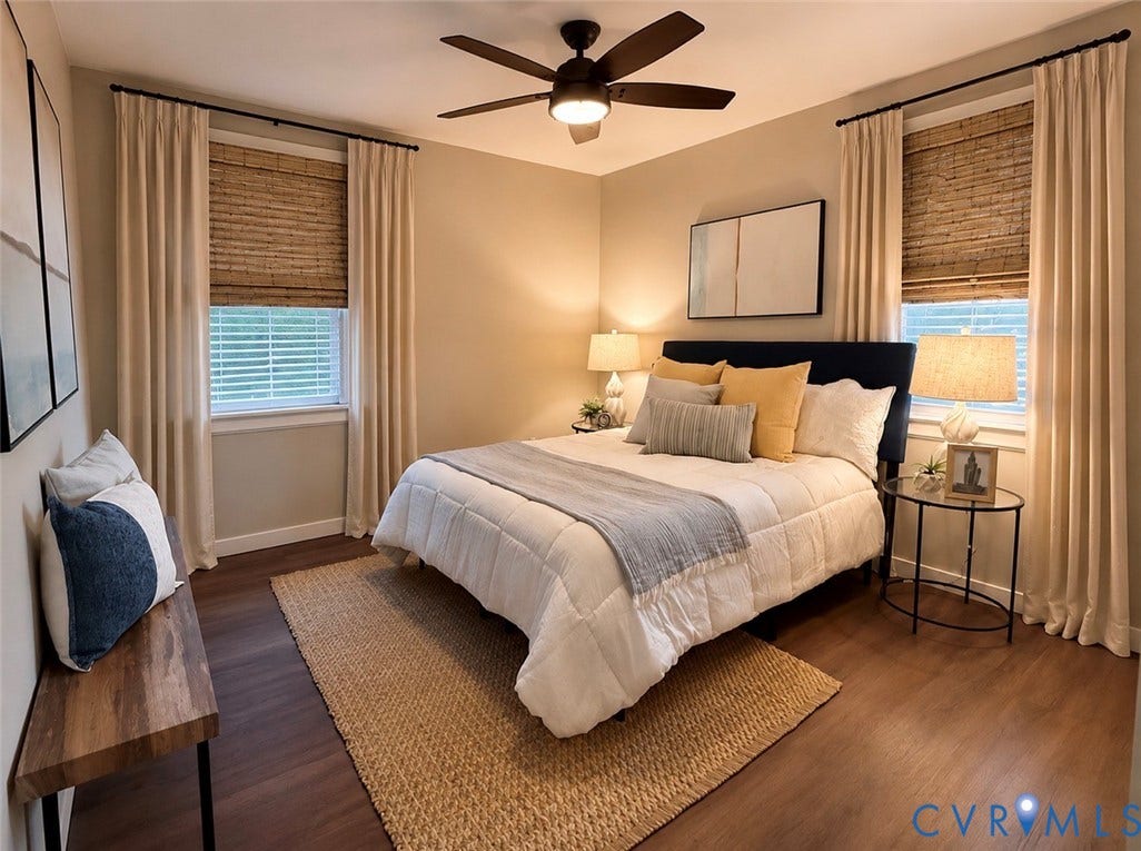 3909 Corbin Street, Wahington Park, Richmond, VA 23222 Spacious room featuring wood-finish flooring, a ceiling fan with integrated lighting, and dual windows