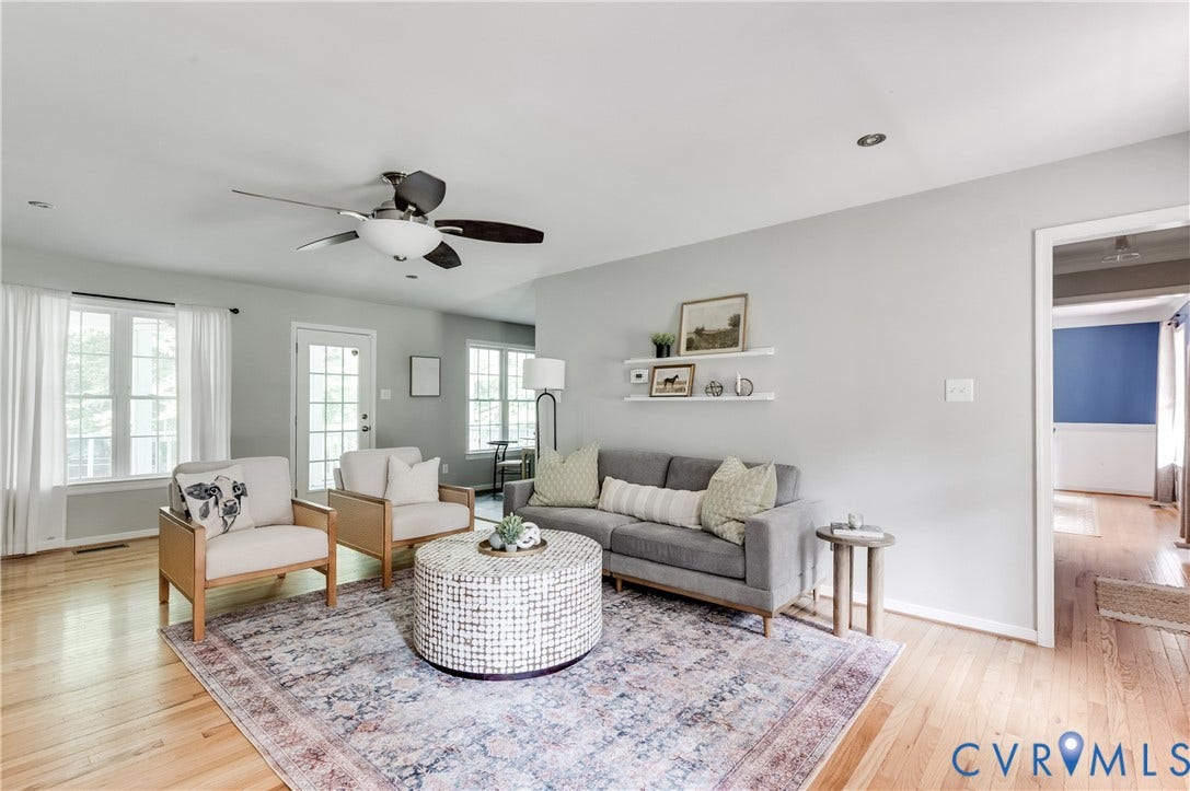 384 Tillar Lane, Mineral, VA 23117 Spacious living area featuring light wood-finish flooring, recessed lighting, and a ceiling fan with integrated illumination
