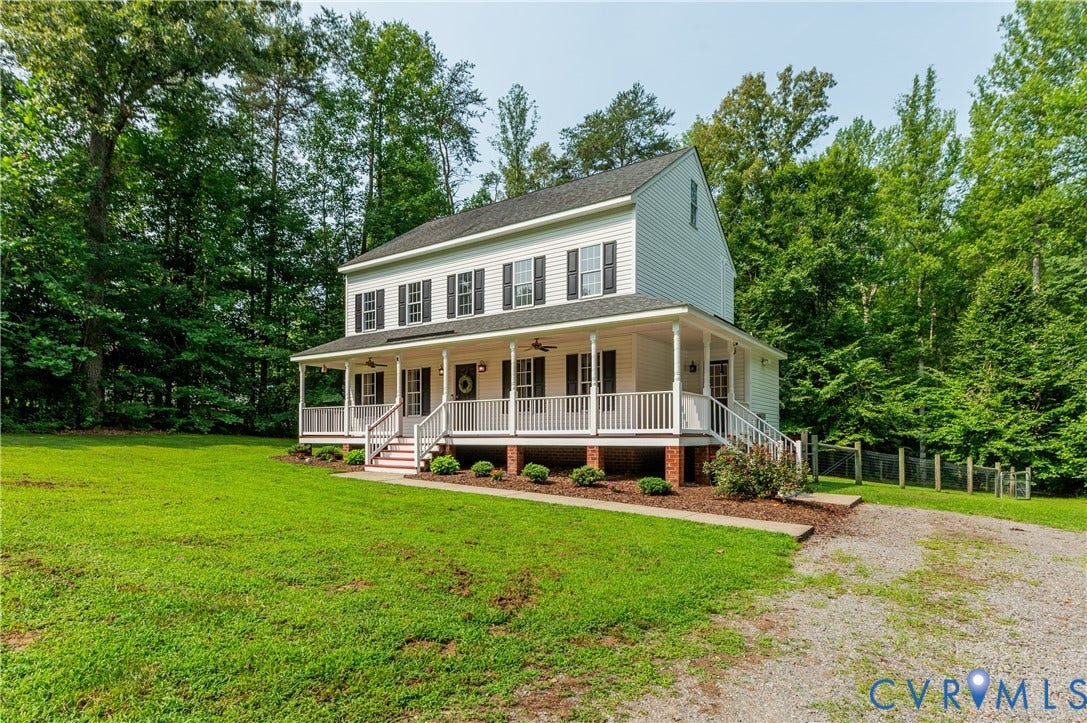 384 Tillar Lane, Mineral, VA 23117 Two-story residence featuring white siding and black shutters