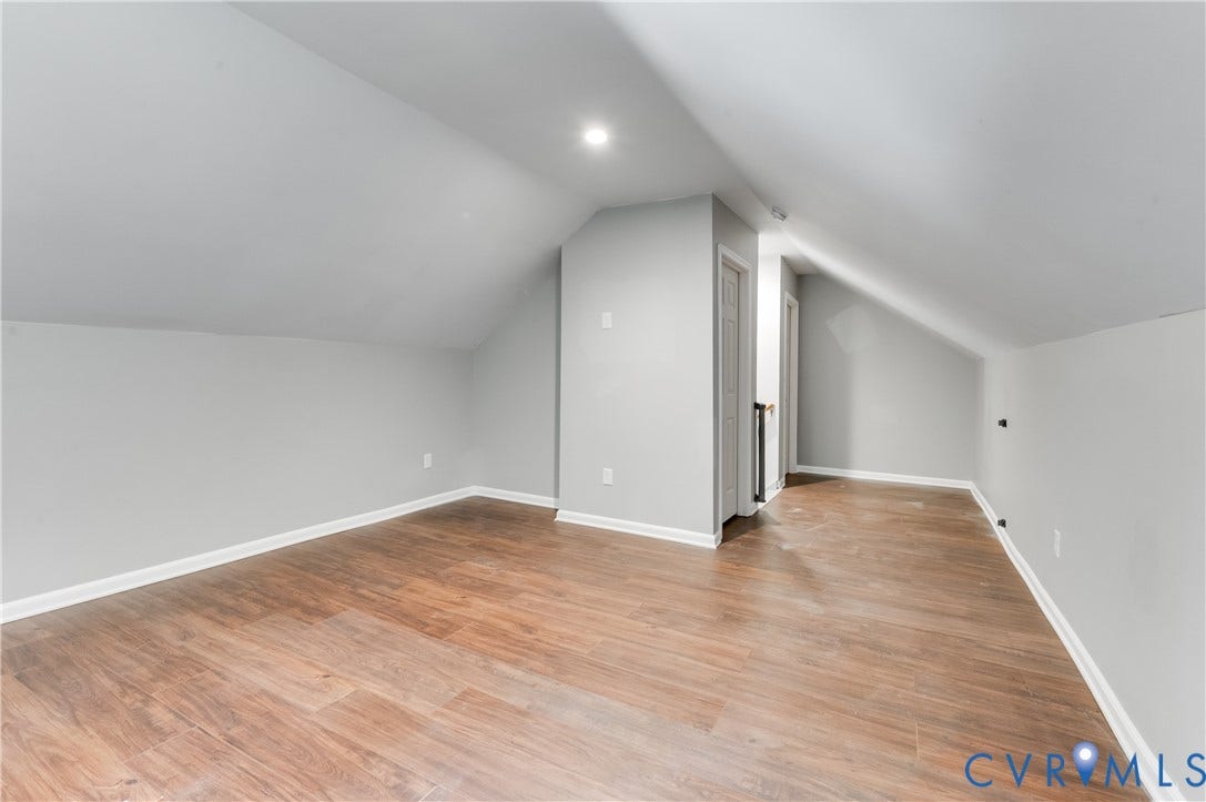 384 Tillar Lane, Mineral, VA 23117 Spacious attic room featuring wood-finish flooring, light gray walls, and recessed lighting