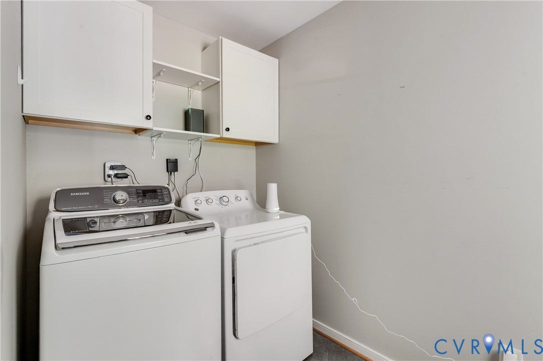 384 Tillar Lane, Mineral, VA 23117 Laundry area featuring white cabinetry with open shelving and light gray walls