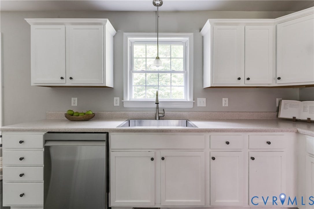 384 Tillar Lane, Mineral, VA 23117 Kitchen featuring white cabinetry with dark hardware, a stainless steel sink, and a stainless steel dishwasher