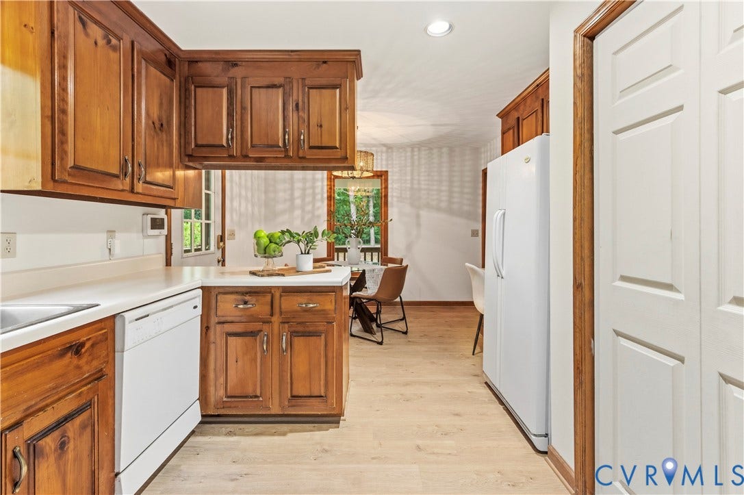 4415 Spoonbill Drive, Powhatan, VA 23139 Kitchen featuring wood cabinetry, white countertops, built-in dishwasher, and wood-finish flooring