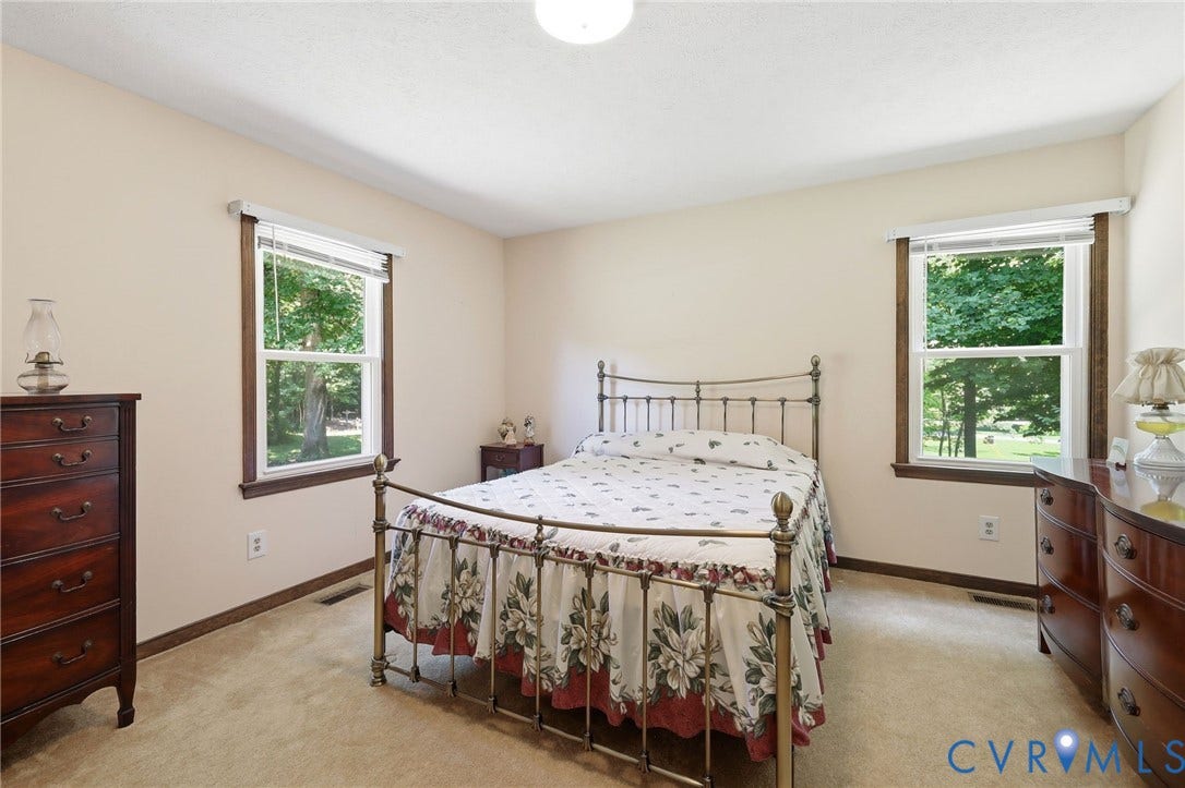 10111 Tunstall Road, New Kent, VA 23124 Neutral wall paint with carpet flooring