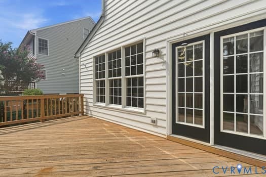 5213 Wheat Ridge Place, Chappell Ridge, Glen Allen, VA 23059 Expansive wood deck with a natural finish, featuring a coordinating wood railing