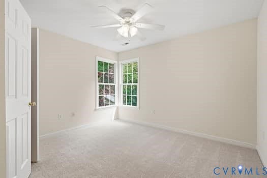 5213 Wheat Ridge Place, Chappell Ridge, Glen Allen, VA 23059 Neutral-toned room with light beige walls and light-colored carpeting