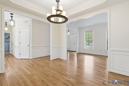 5213 Wheat Ridge Place, Chappell Ridge, Glen Allen, VA 23059 Spacious interior featuring wood-finish flooring, wainscoting, a contemporary chandelier, and recessed lighting