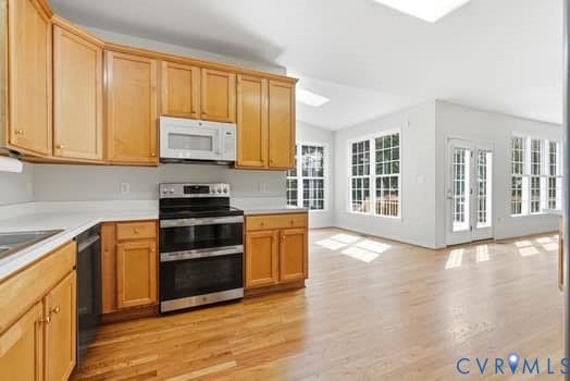 5213 Wheat Ridge Place, Chappell Ridge, Glen Allen, VA 23059 Kitchen featuring wood-finish cabinetry, white countertops, and stainless steel appliances