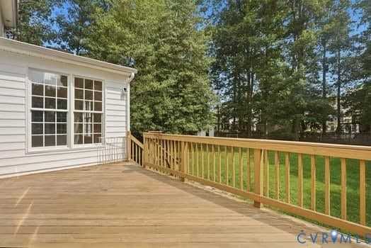 5213 Wheat Ridge Place, Chappell Ridge, Glen Allen, VA 23059 Expansive wood deck with a natural finish, featuring a full railing system