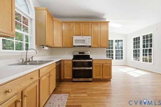 5213 Wheat Ridge Place, Chappell Ridge, Glen Allen, VA 23059 Kitchen featuring light wood cabinetry, white countertops, and a stainless steel double oven range