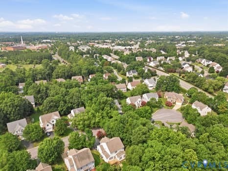5213 Wheat Ridge Place, Chappell Ridge, Glen Allen, VA 23059 Expansive aerial perspective showcasing a residential area with varied home styles and abundant mature trees