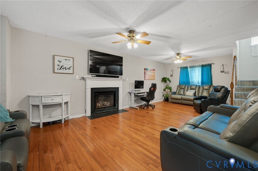 1207 Wycliff Court, Richmond, VA 23236 Expansive living area with wood-finish flooring