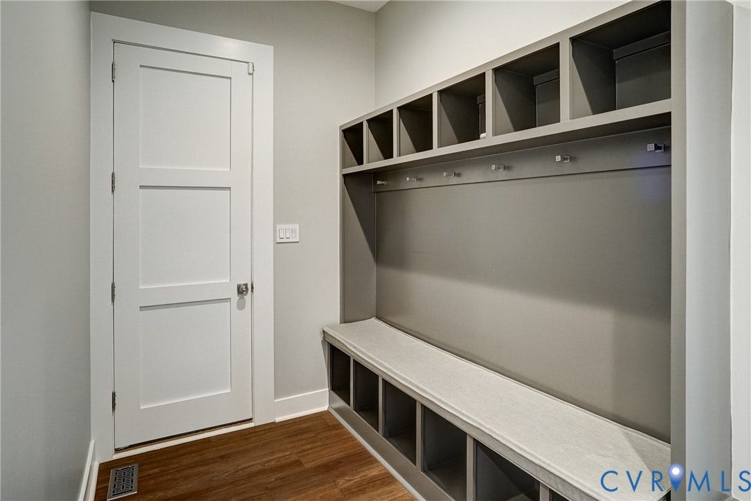 1732 Fishers Pond Drive, Maidens, VA 23102 Integrated built-in mudroom storage featuring a bench, individual cubbies, and coat hooks