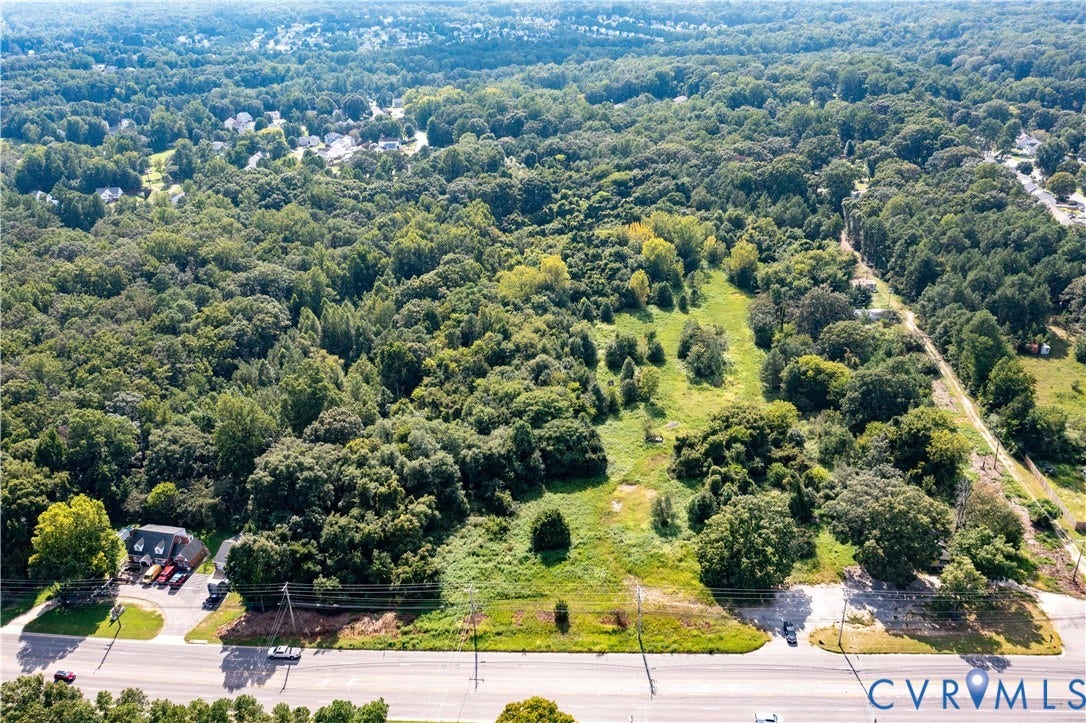 13500 Route 1, Chester, VA 23831 Expansive undeveloped land with significant tree coverage and clearings