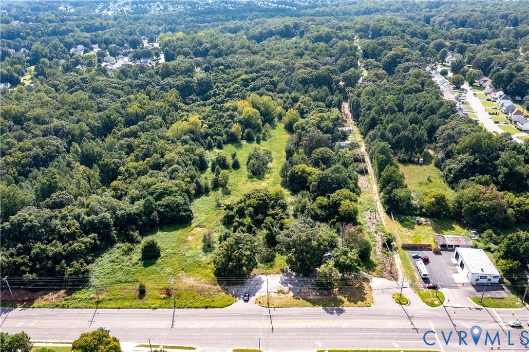 13500 Route 1, Chester, VA 23831 Expansive wooded land featuring cleared areas and direct road frontage