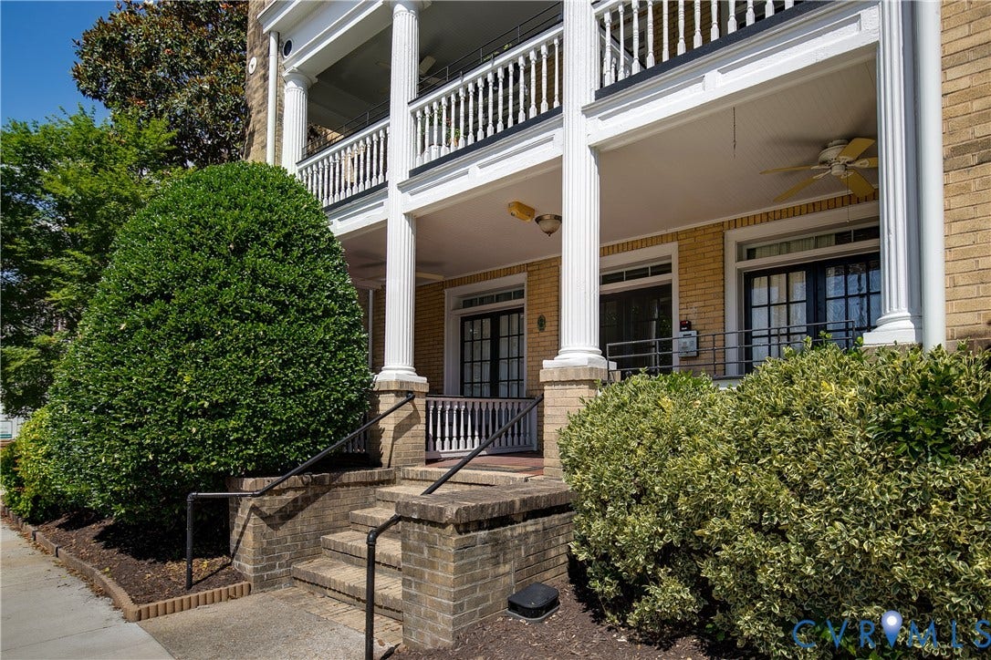 601 Roseneath Road, #U1, Museum District, Richmond, VA 23221 Brick exterior featuring a multi-level porch with white columns and railings