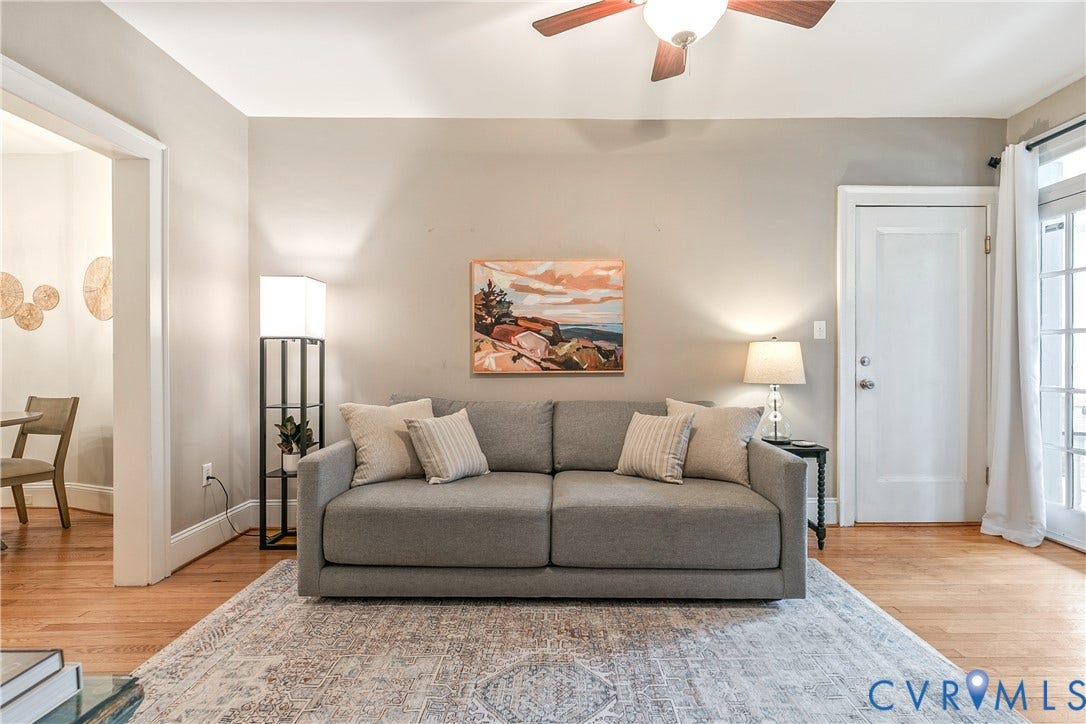 601 Roseneath Road, #U1, Museum District, Richmond, VA 23221 Living area featuring hardwood-finish flooring, neutral wall tones, a ceiling fan, and a door with glass panels