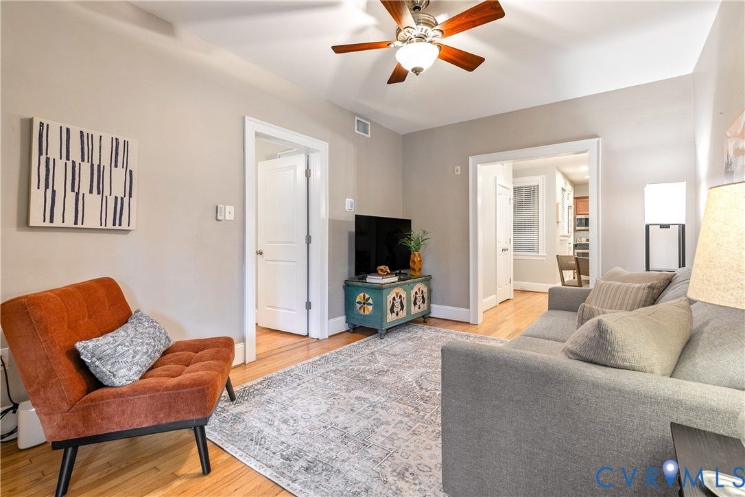 601 Roseneath Road, #U1, Museum District, Richmond, VA 23221 Living area with wood-finish flooring, light-toned wall paint, and a ceiling fan with integrated lighting