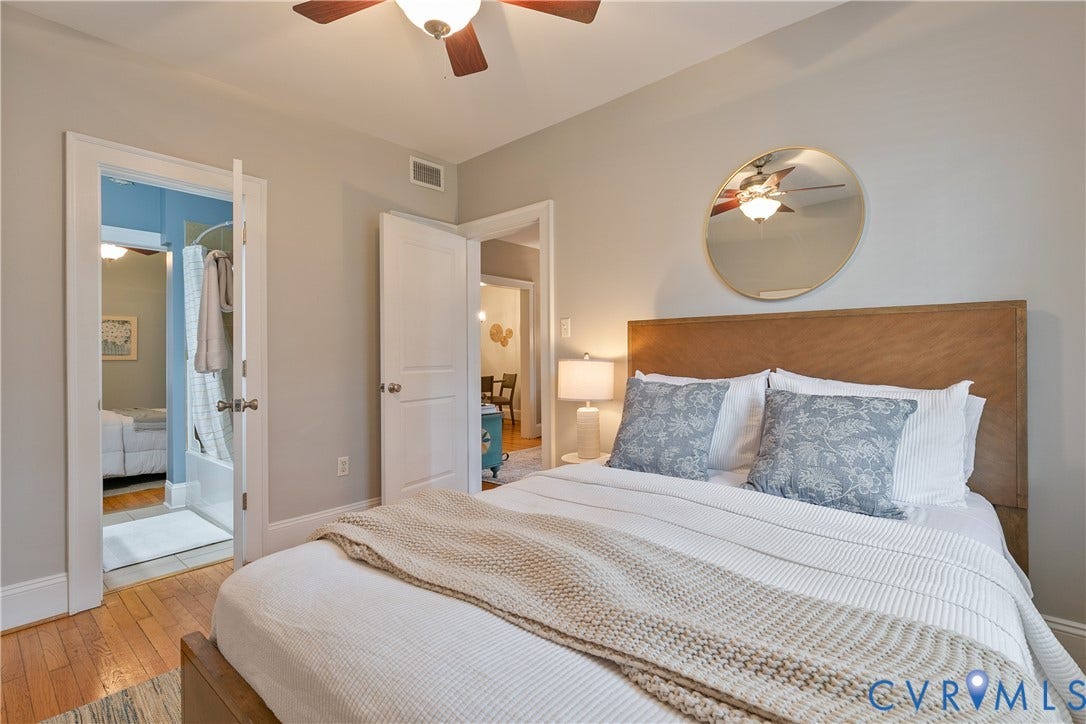 601 Roseneath Road, #U1, Museum District, Richmond, VA 23221 Bedroom featuring hardwood flooring, a ceiling fan with light fixture, and light gray wall paint