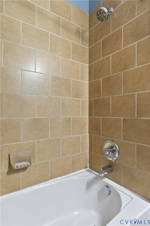 601 Roseneath Road, #U1, Museum District, Richmond, VA 23221 White bathtub with a chrome shower head and faucet set