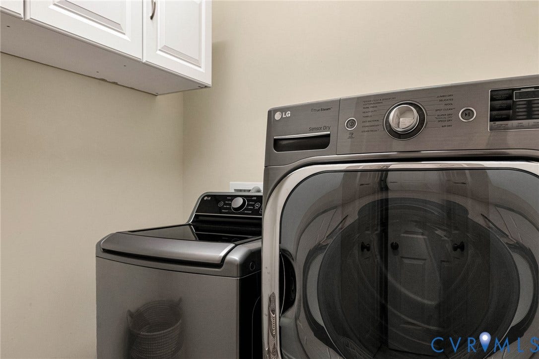1020 Belva Court, Glen Allen, VA 23059 Front-loading washing machine and top-loading washing machine in a laundry area
