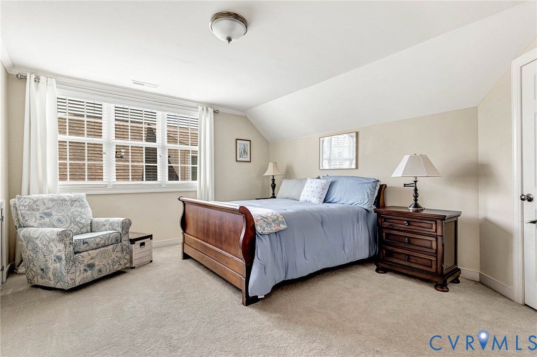 1020 Belva Court, Glen Allen, VA 23059 Carpeted room with a multi-pane window, white window treatments, and a built-in architectural feature in the ceiling
